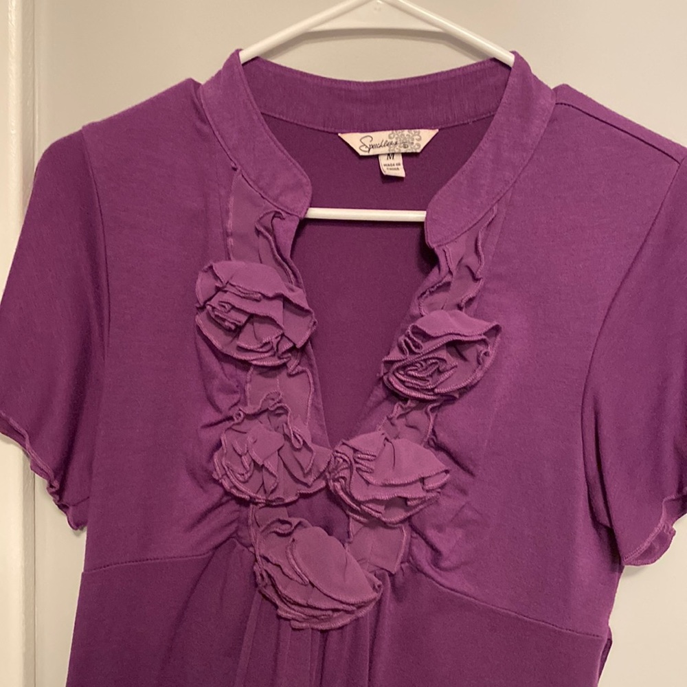 Lightweight, comfortable, purple dress. Ties in back. Cute with sandals or boots